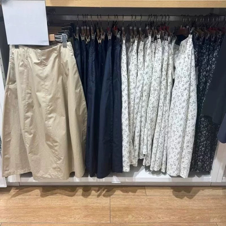 Jupe midi femme avec taille élastique et poches latérales Chic & Stil