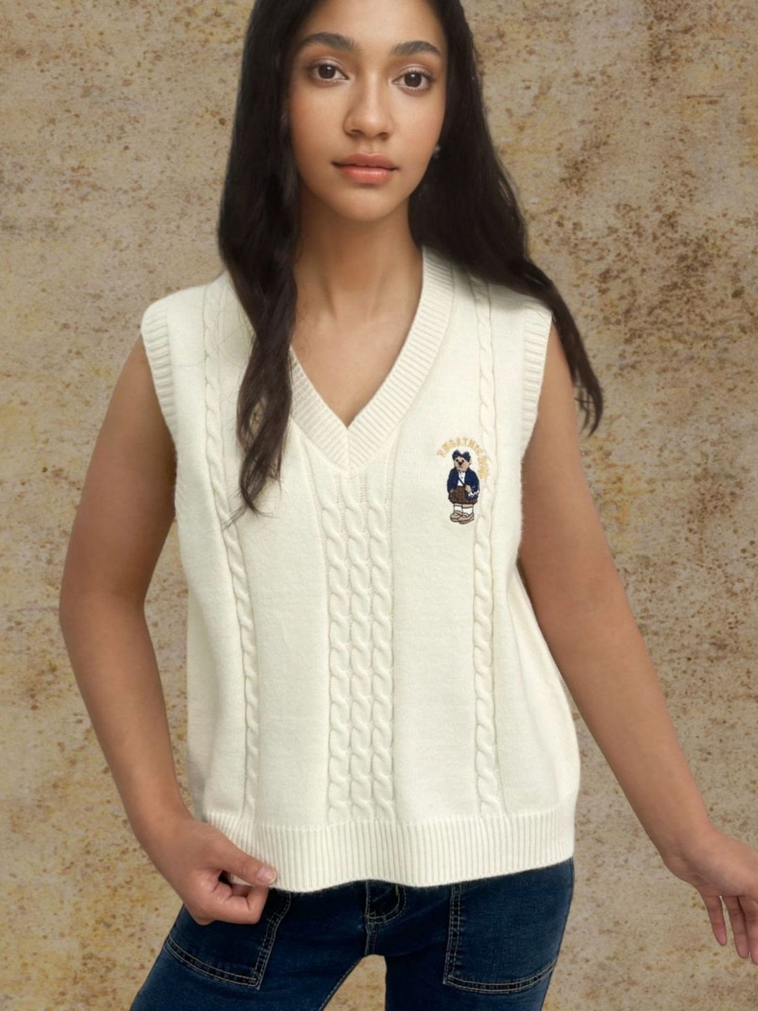 Knitted vest for women with V-neck and embossed pattern Lune London