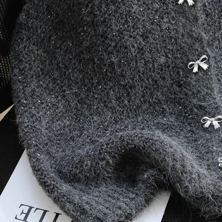 Gilet en tricot pour femmes avec accents scintillants et boutons décoratifs Chic & Stil