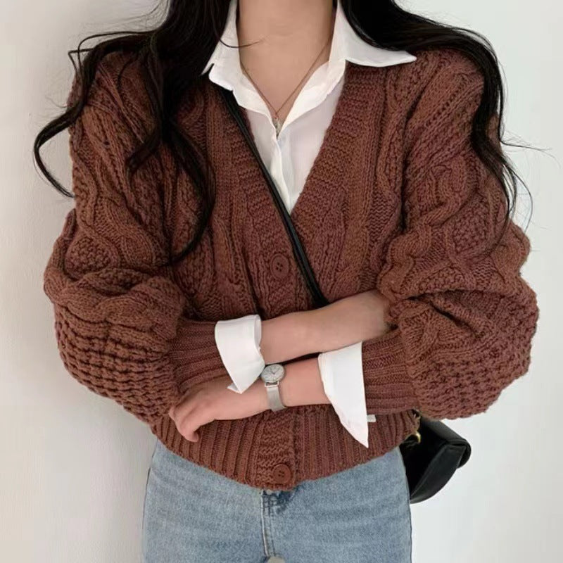 Thick knitted jacket for women with voluminous sleeves and a unique cable pattern Lune London