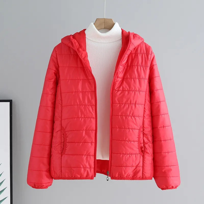 Ladies quilted transitional jacket with practical pockets and hood Lune London