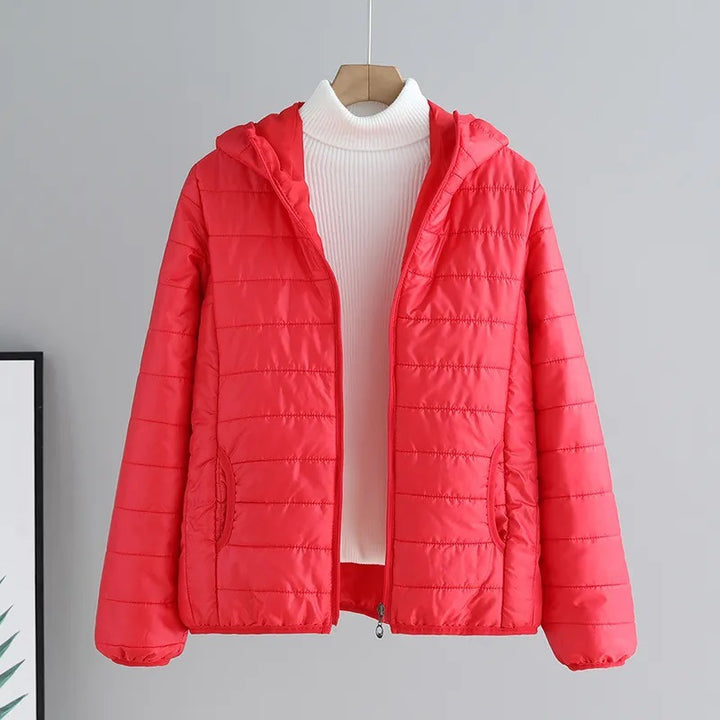 Ladies quilted transitional jacket with practical pockets and hood Lune London