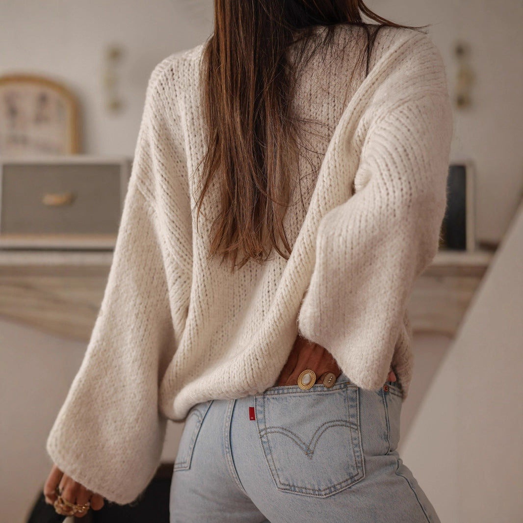 Ladies comfortable pullover with oversized sleeves and elegant pearl buttons Lune London