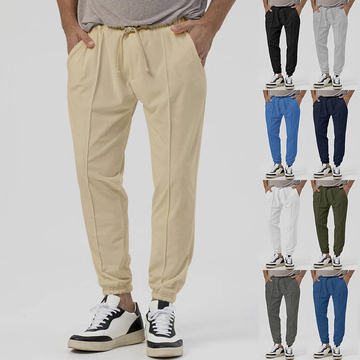Sporty men's joggers with elastic waistband and zippers Lune London