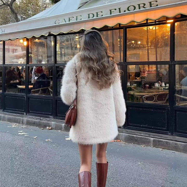 Faux fur coat for women with chic lapels and deep pockets Lune London