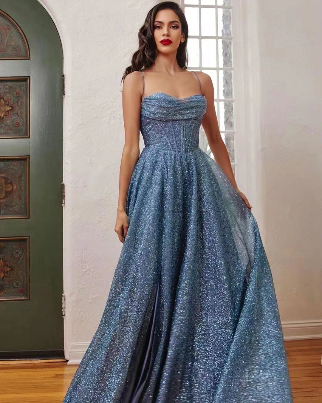 Glamorous evening dress for women with deep neckline and sparkling fabric Lune London