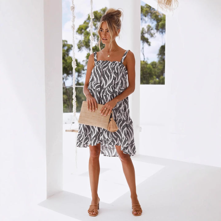Women's Airy Beach Dress with Voluminous Skirt and Ruffle Details Lune London