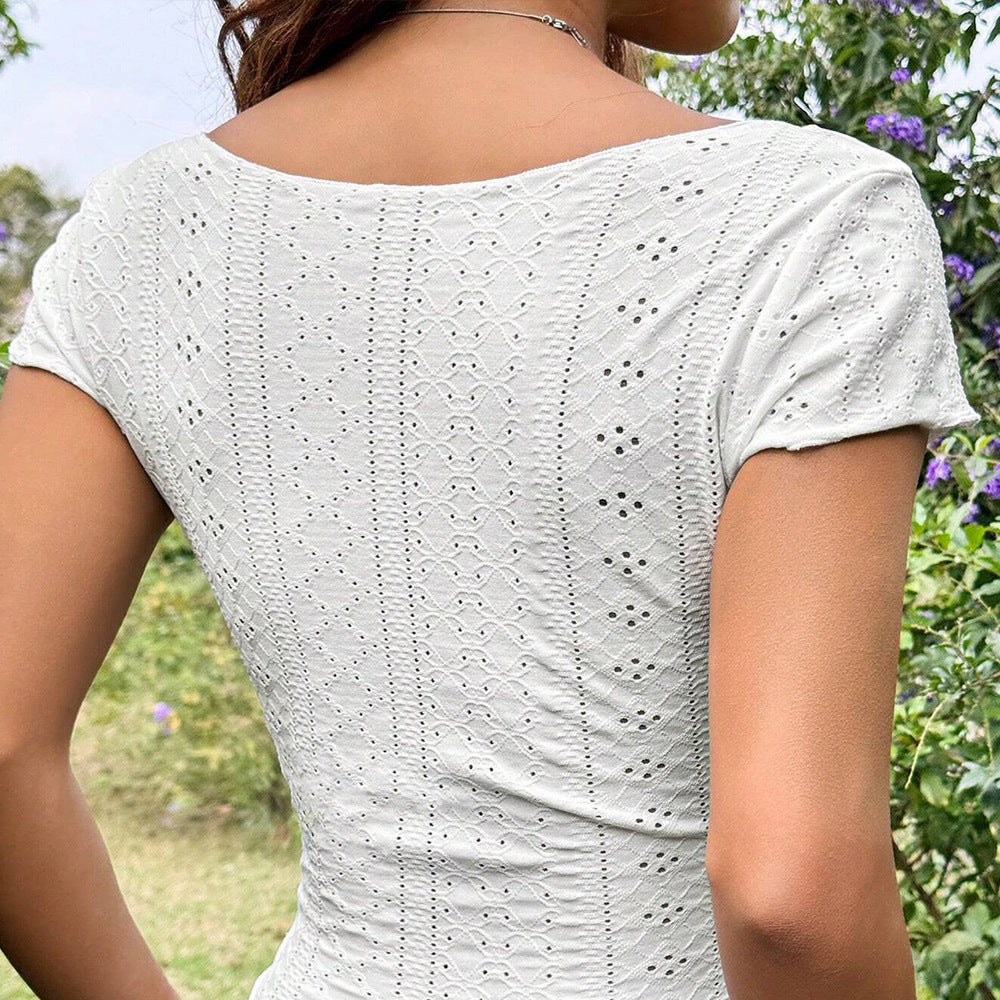 Chic & Stil women's crop top with embellished hole patterns and a fitted cut