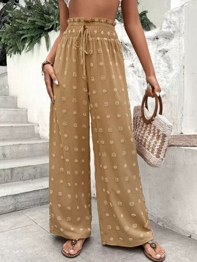 Wide palazzo pants for women with elastic waistband and decorative pattern Lune London