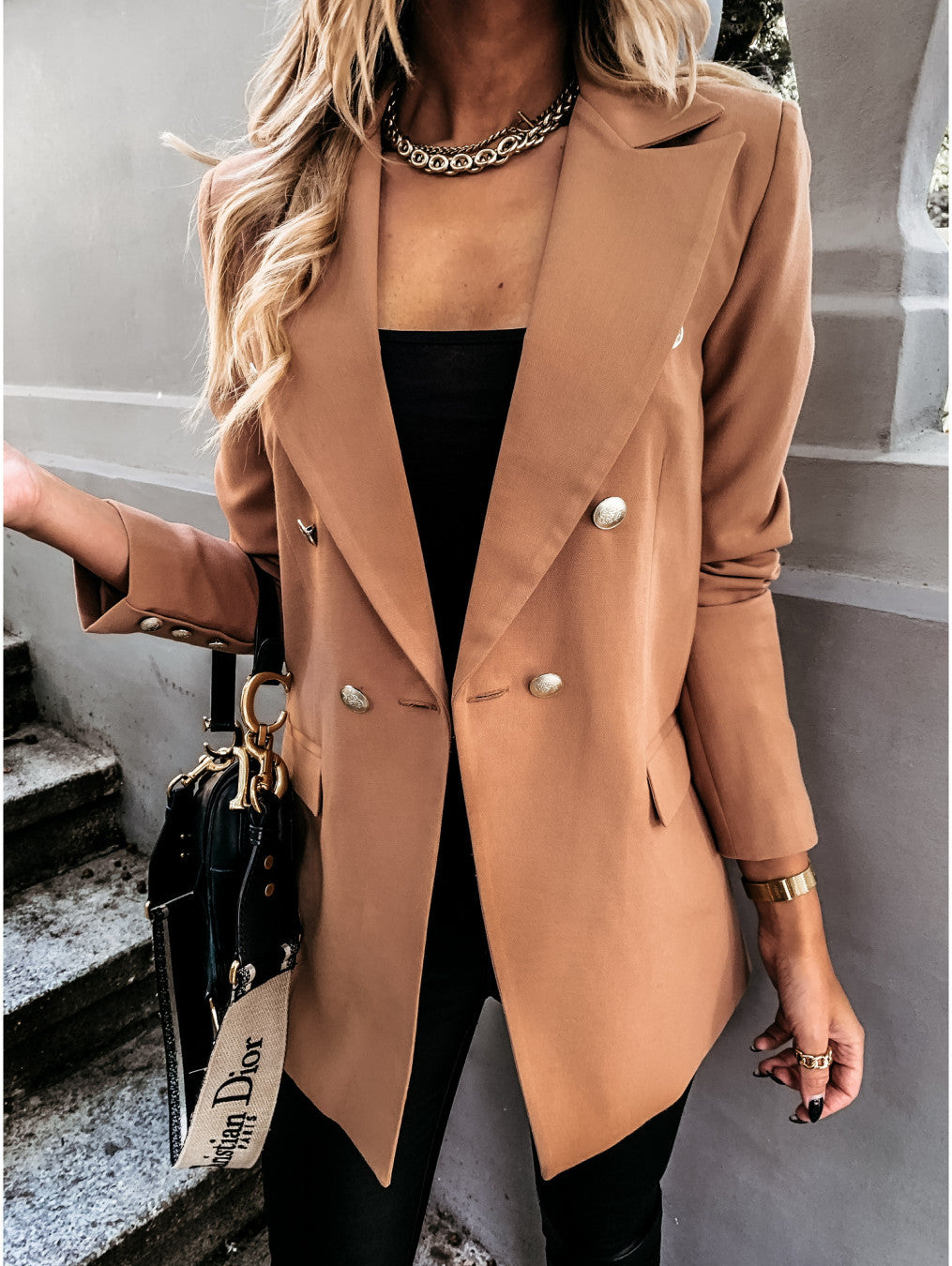 Ladies elegant blazer with double-breasted fastening and chic fashion accents