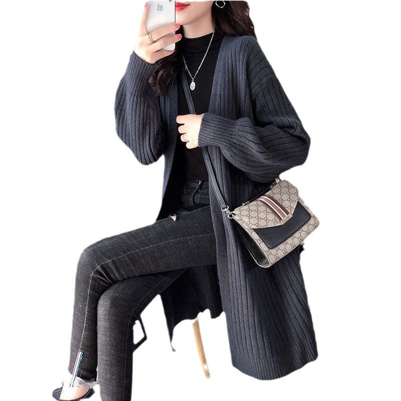 Striped chunky knit cardigan for women with an open cut and long sleeves Lune London