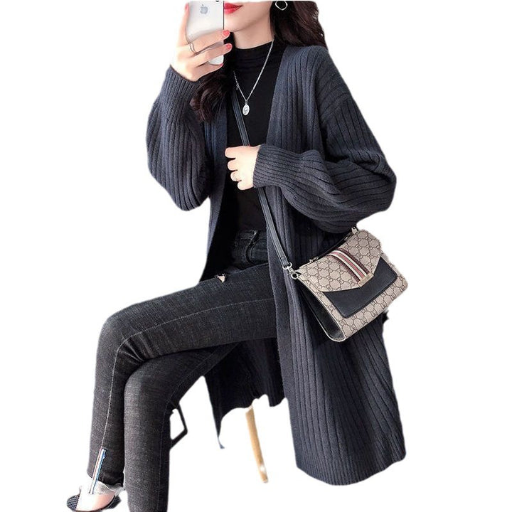 Striped chunky knit cardigan for women with an open cut and long sleeves Lune London