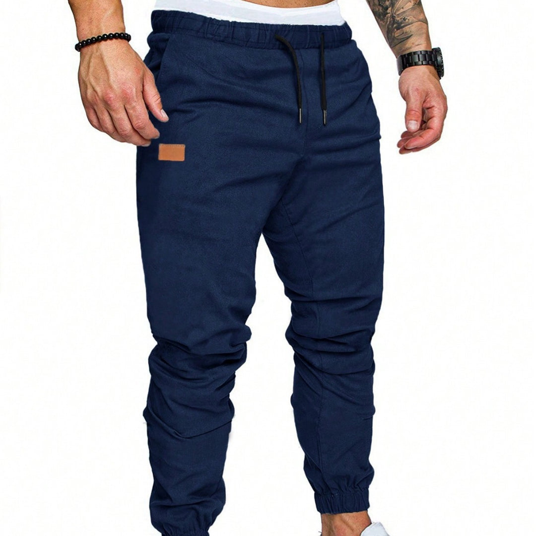 Casual men's jogging pants with elastic waistband and practical zipped pockets Lune London