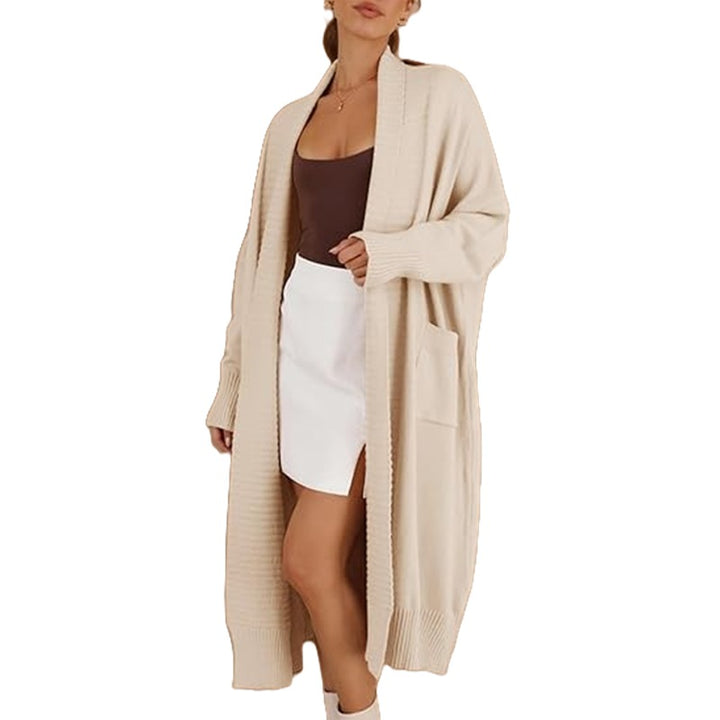 Ladies lightweight knit coat with wide sleeves and practical piped pockets Lune London