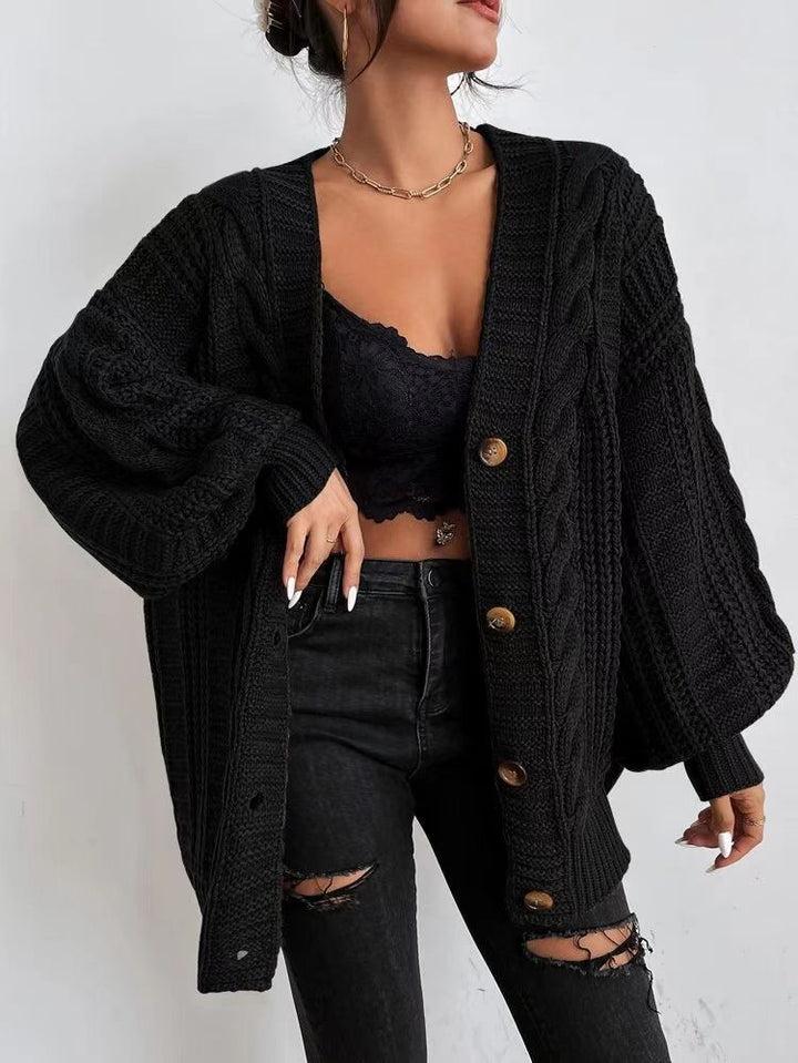 Oversized knitted cardigan for women with an elegant cable pattern and practical buttons Lune London