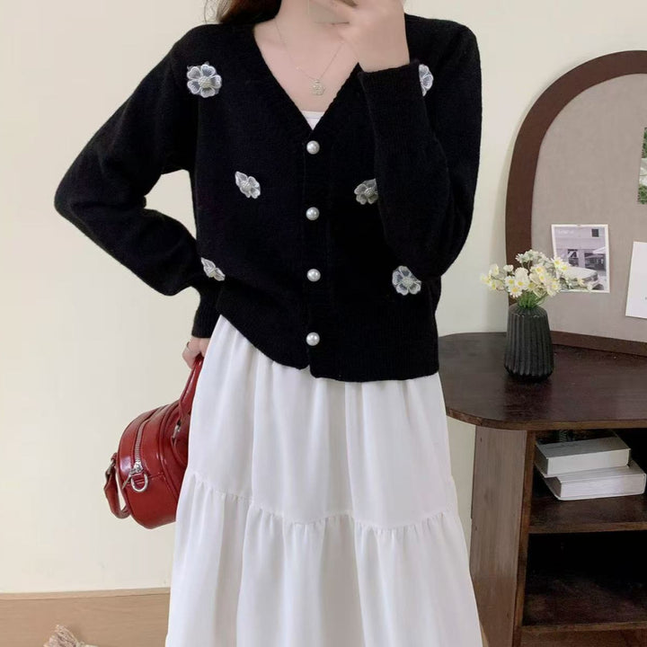 Ladies cozy knit vest with flower embroidery and pearl buttons Lune London