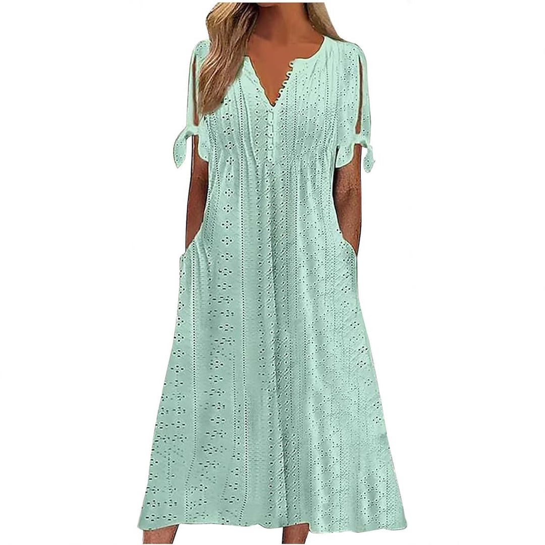 Airy midi dress for women with decorative hole patterns and practical pockets Lune London