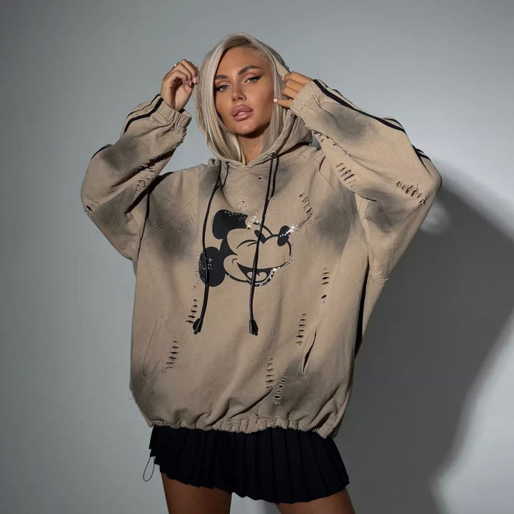 Oversized hoodie for women with trendy tear details and graphic print Lune London