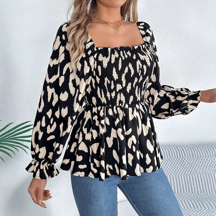 Trendy women's blouse with ruffles and chic animal print Lune London