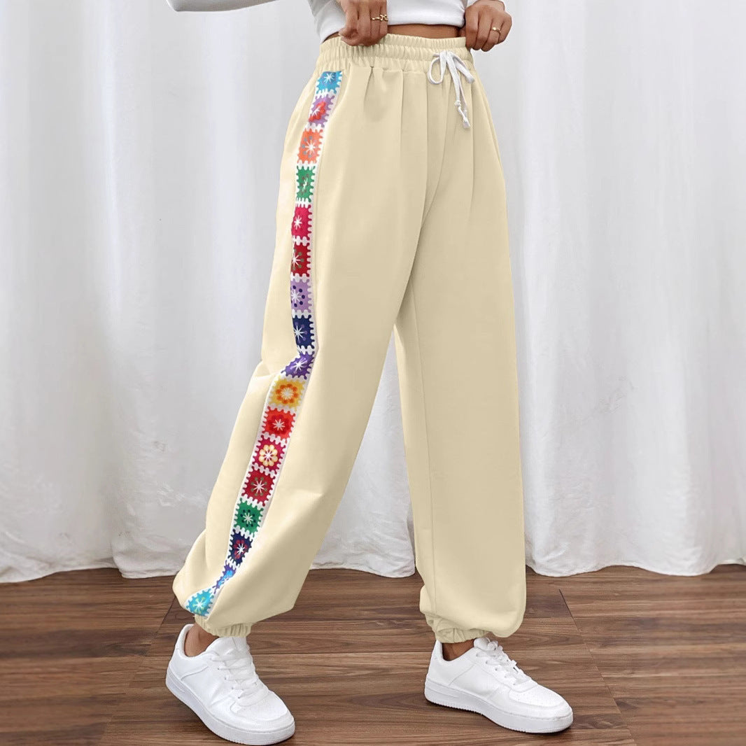 Leisure pants for women with a colorful floral pattern and an elastic waistband Lune London