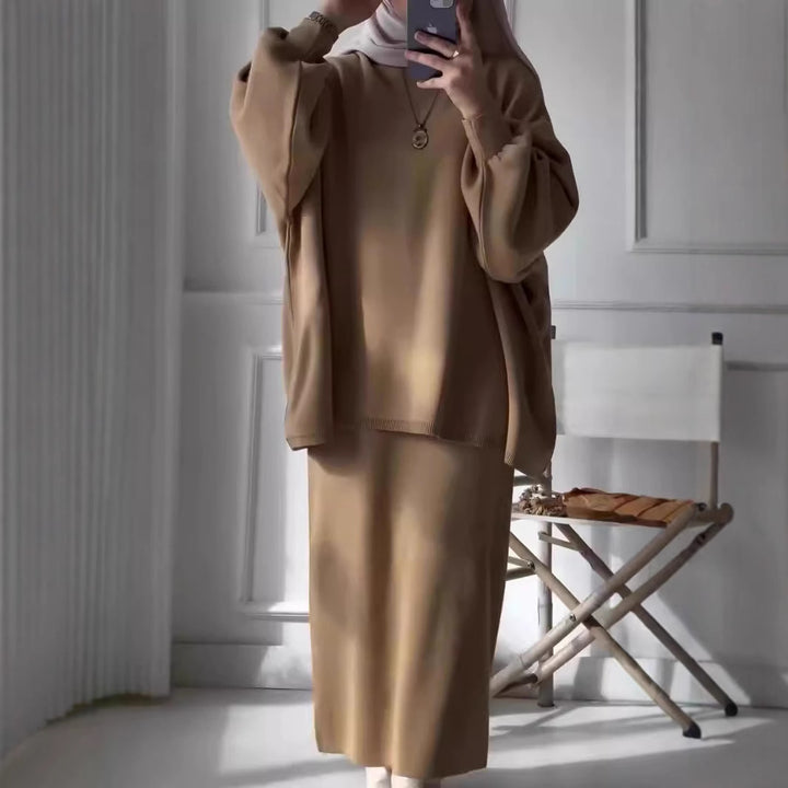 Elegant set for women made up of a casual sweater and a chic midi skirt.