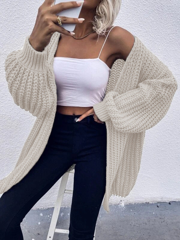 Thick knit cardigan for women with voluminous sleeves and a front opening Lune London