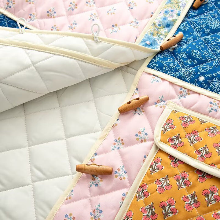 Quilted transition jacket for women with floral patterns and large pockets Lune London