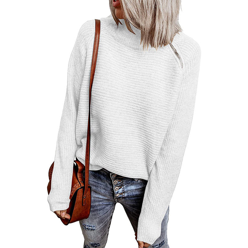 Trendy oversized women's sweater with stylish high collar and raglan sleeves Lune London