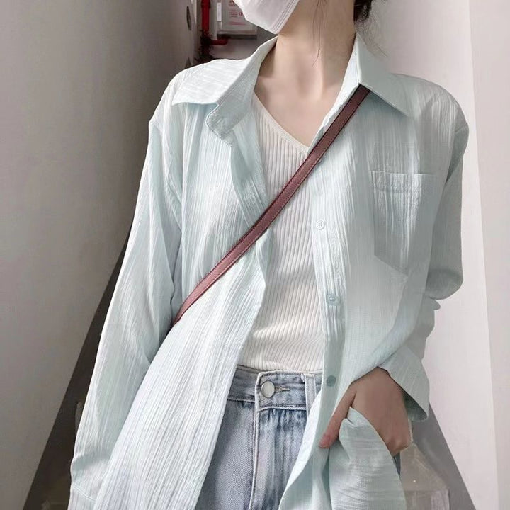 Women casual long sleeve blouse with textured fabric and stylish accents Lune London