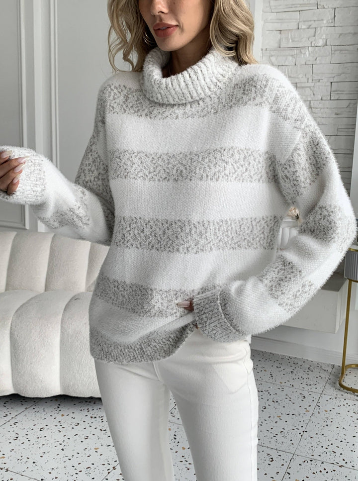 Pull féminin douillet avec col haut et design rayé Chic & Stil