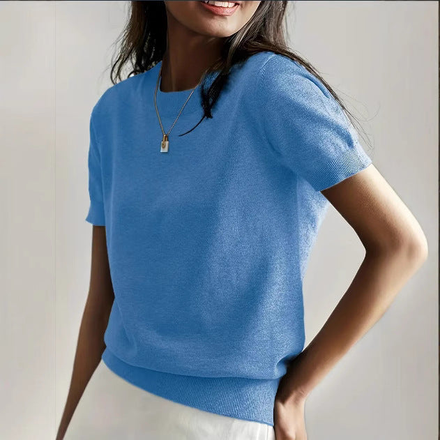 Fine knit sweater for women with a short sleeve silhouette and a soft fluid material Elegance and style