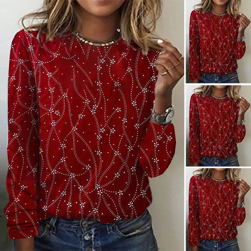 Haut élégant pour dames avec des détails floraux et des accents scintillants Chic & Stil