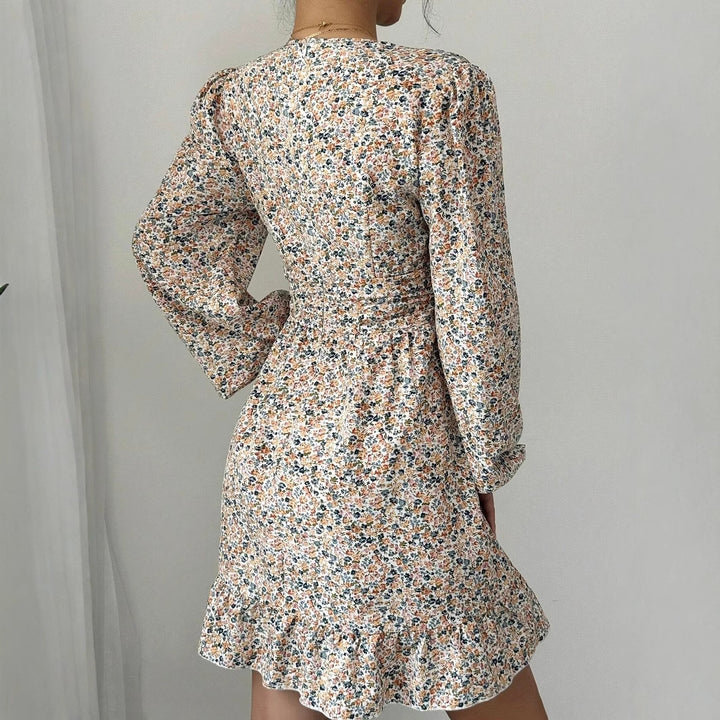 Mini dress adorned with flowers for women with deep V-neck and voluminous sleeves Lune London