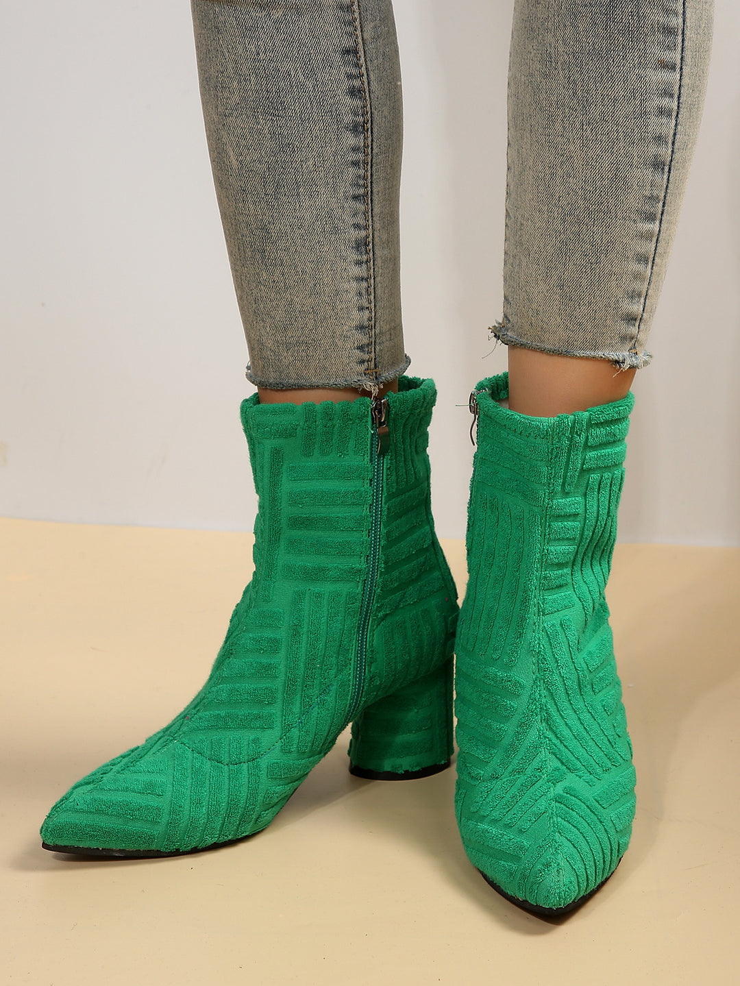 Women's ankle boots with a contemporary knit design and a comfortable block heel Lune London