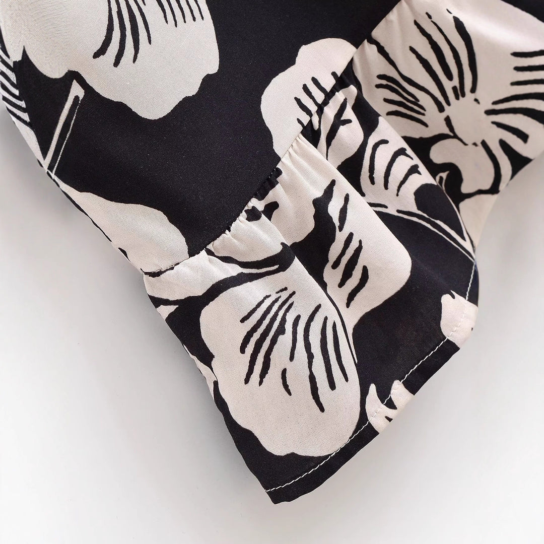 Maxi dress for women with floral embroidery and elegant ruffles Lune London