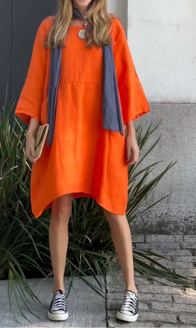 Casual linen dress for women with practical pockets and asymmetrical hem Lune London