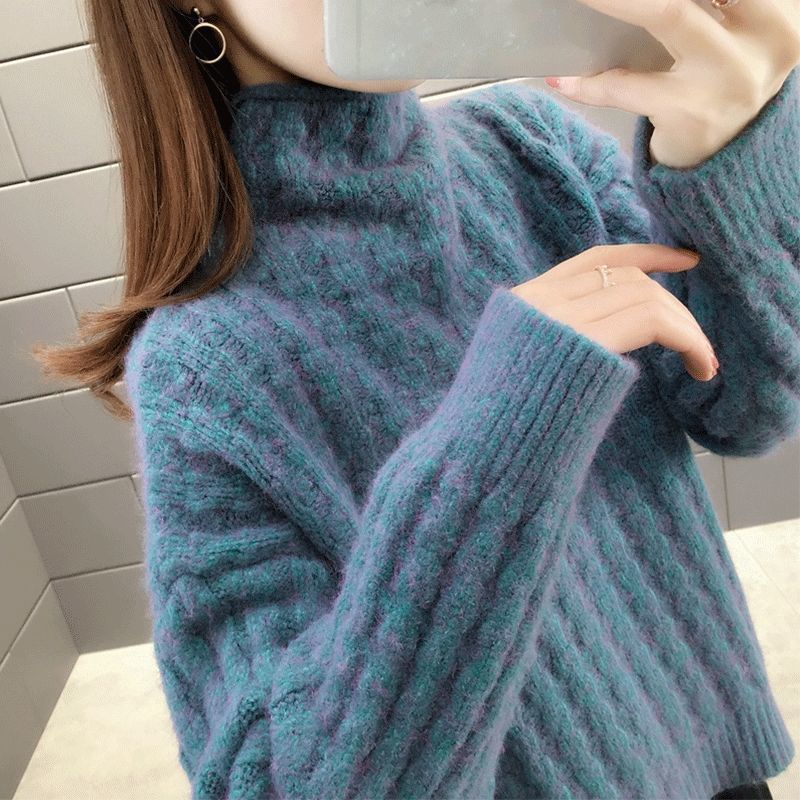 Knitted sweater for women with a modern ribbed design featuring a high collar and relaxed sleeves Lune London