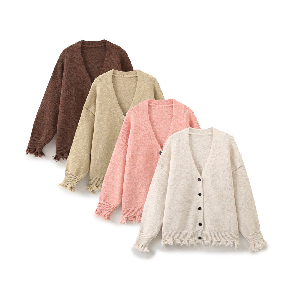 Casual knitted jacket for women with fringed hem and button closure Lune London