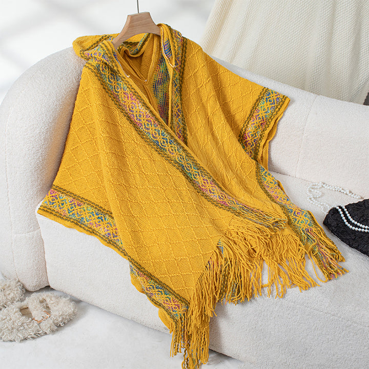 Elegant poncho for ladies with high-quality structured design and fringes Lune London