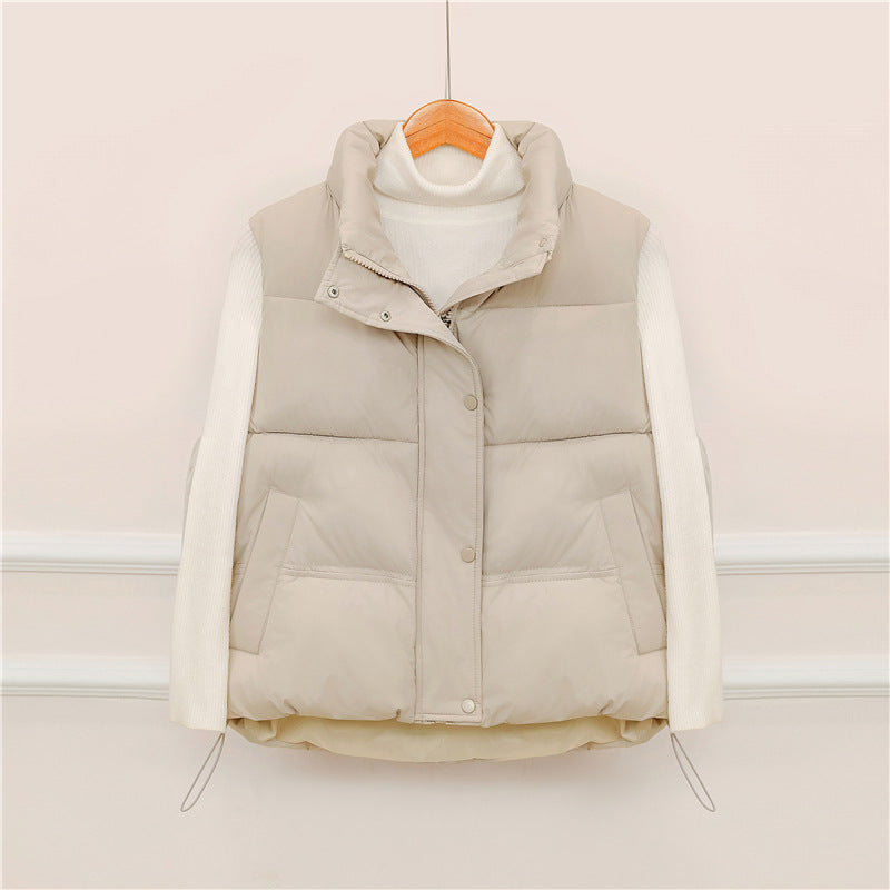 Sporty quilted vest for women with high collar and practical pockets Lune London