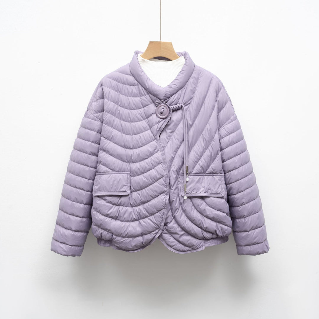 Trendy quilted jacket for women with asymmetrical cut and practical pockets Lune London