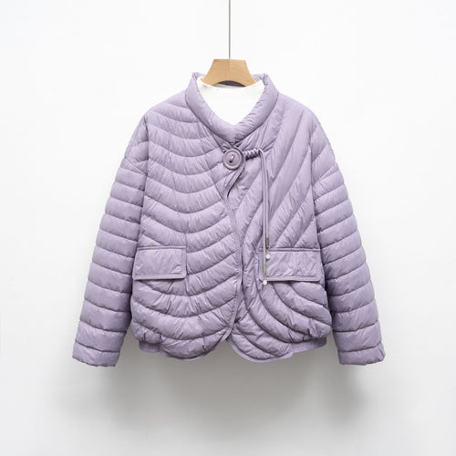 Trendy quilted jacket for women with asymmetrical cut and practical pockets Lune London