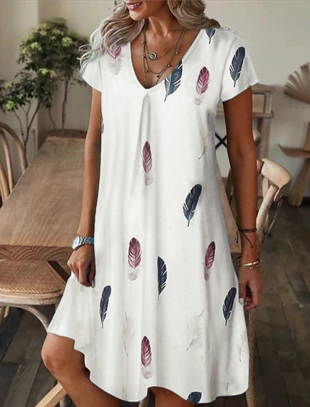 Fluid V-neck midi dress for women with abstract pattern Lune London