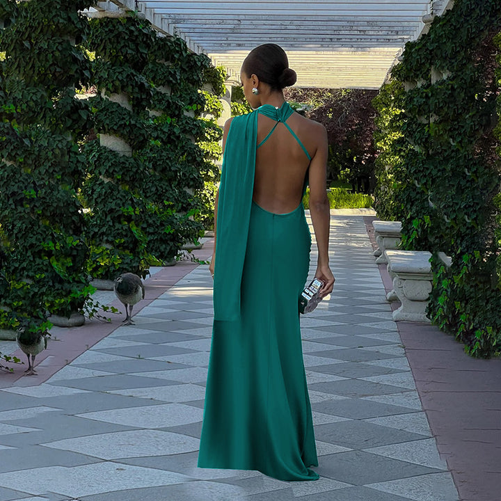 Ladies elegant maxi dress with asymmetric halter design and silky top material