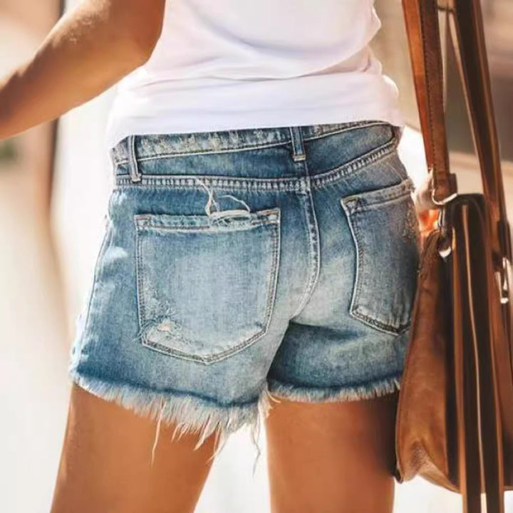 Women's Destroyed Denim Shorts in a Modern Look with Fringes Lune London
