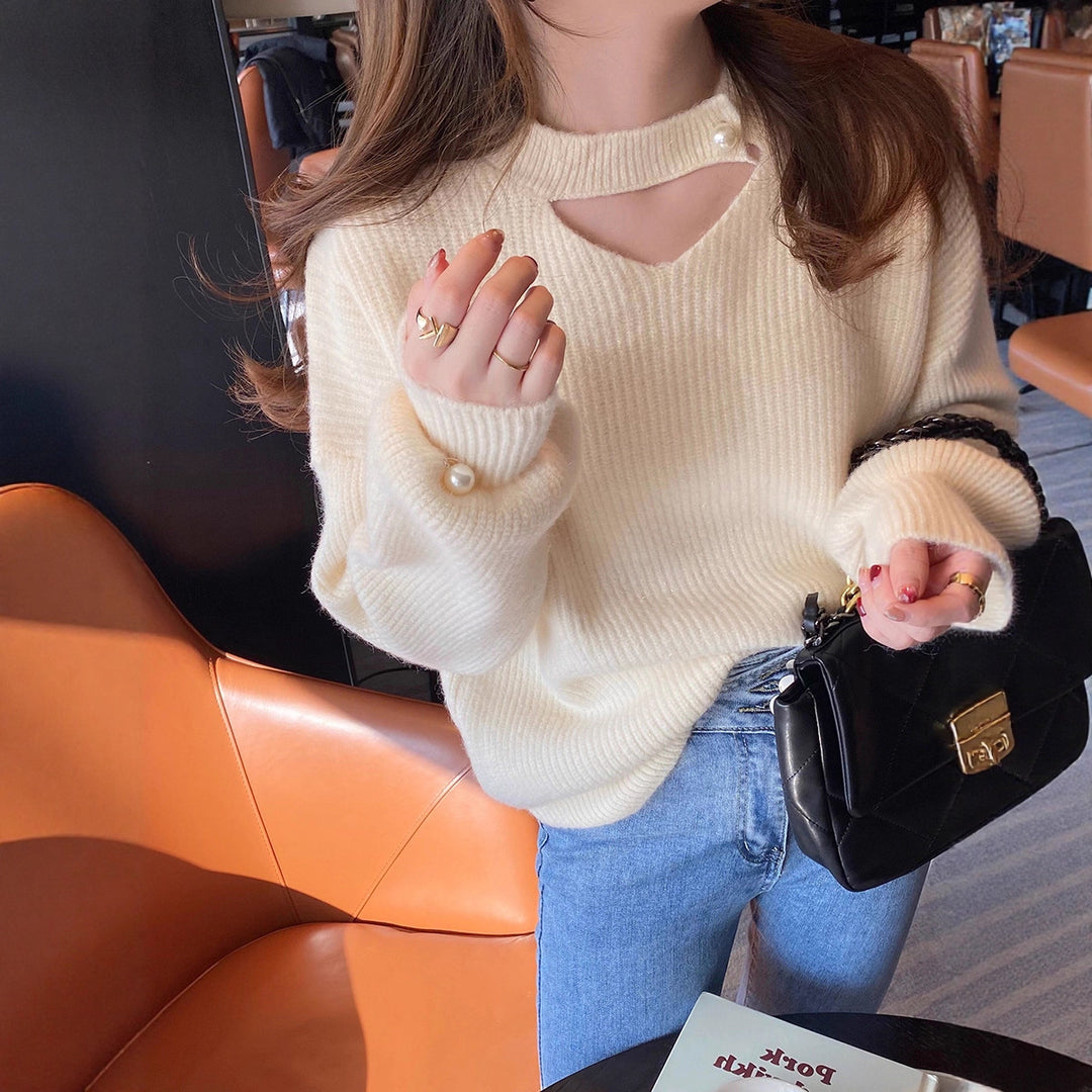 Pull en tricot pour femmes avec un look cut-out raffiné et des manches ornées de perles Lune London