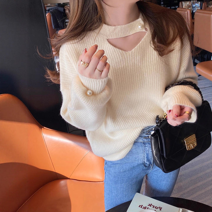 Pull en tricot pour femmes avec un look cut-out raffiné et des manches ornées de perles Lune London