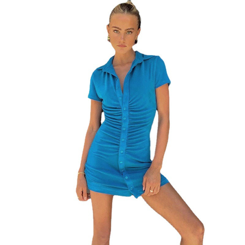 Short fitted dress for women with short sleeves, vertical ruched effect and trendy button details from Lune London