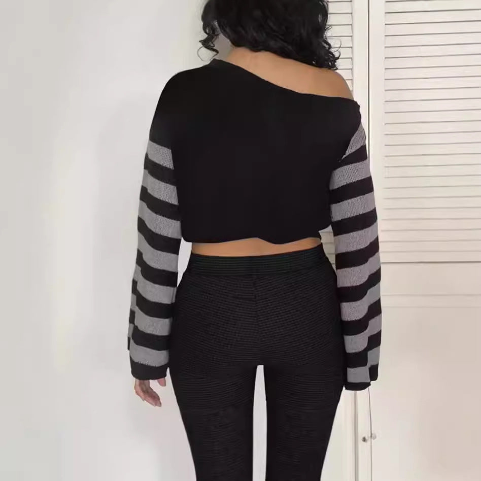 Trendy oversized sweater for women with a creative spiral design and a striped pattern Lune London