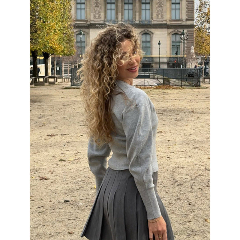 Trendy knit jacket for women with pleated sleeves and chic and stylish button details